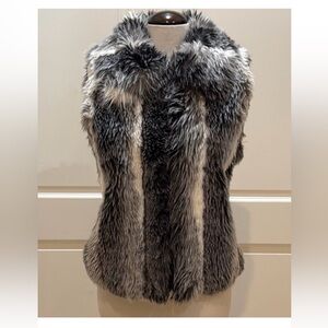 St. John faux fur zip up vest price is firm